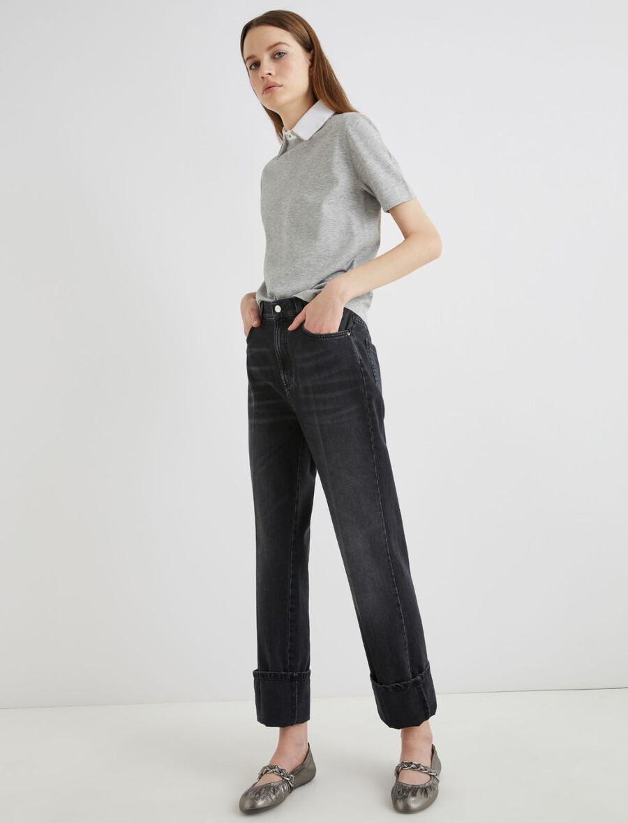 toppstickade jeans med vida ben - svart